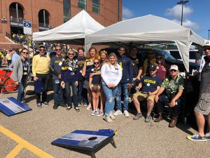 Group photo of M-SPAN friends and staff at 2019 UM Football Military Appreciation Game tailgate