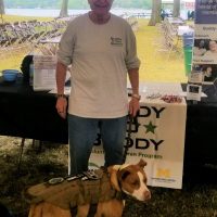Paul Jingozian with his service dog Sierra