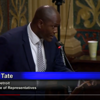 Still photo of Rep. Joe Tate proclaiming June Buddy-to-Buddy Month in the Michigan House of Representatives