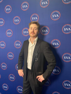 Man standing in front of an SVA background