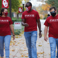 Three student veterans walking together